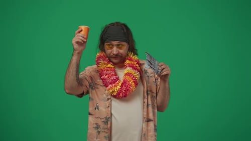 Man Drinks and Brandishes Cash on Green Screen