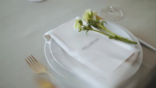 An Elegant and Charming Table Setting Enhanced with Beautiful Floral Accents for Any Occasion