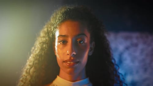 Close up Portrait of a Curly Haired Woman