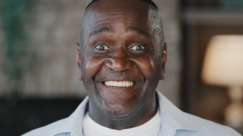 Man Smiling Close Up to Camera