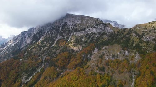 Autumn colors on beautiful Alps mountains of Albania with golden foliage rocky slopes