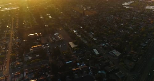 City of Napa, California, USA at sundown. Vast urban panorama against bright sunny