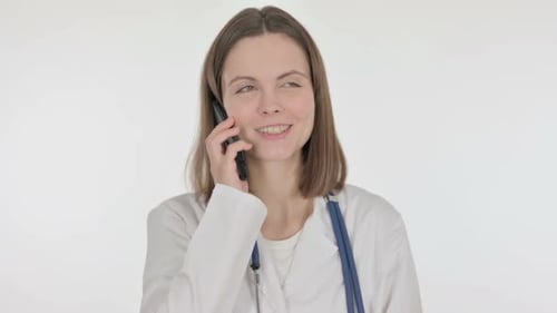 Female Doctor Talking on Phone in White Coat