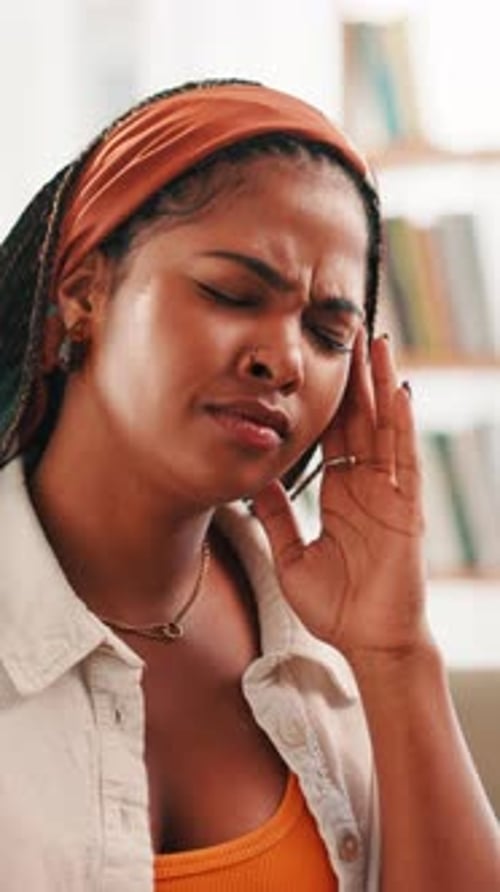 African, woman and pain with headache at house for brain fog, vertigo and stress of university debt