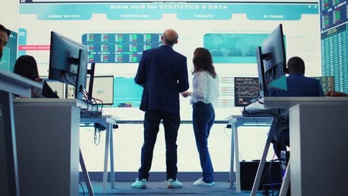 Financial Team Collaborates in Modern Tech Office