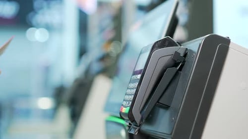 Close up Woman At Counter Buy electronic payment supermarket by credit card close-up. African