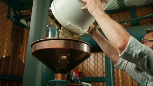 Loading Green Coffee Beans into Roaster