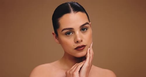 Makeup, lipstick and face of woman in studio for cosmetics, beauty and aesthetic glow