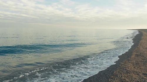Slow Waves Of Ocean Water Crash On The Shore For Relax Moment