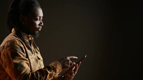 Model Holding Mobile Tablet to Check Websites