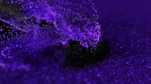 Swirling Purple and Black Particles Create an Abstract Mesmerizing Visual with Dynamic Motion and