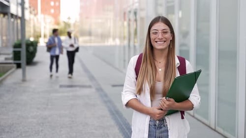 College Student Girl Smiling Ready for Classes at the University Campus Higher Education