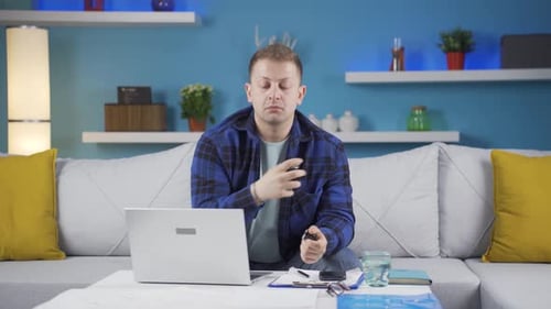 Home office worker sprays perfume on man.
