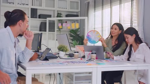 Group of Asian businessman and businesswoman working in the office.
