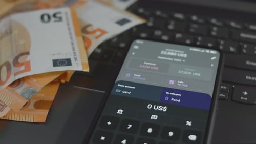 Smart Money Management Using Technology to Track Budget A Person Who Uses a Cell Phone to Do Their