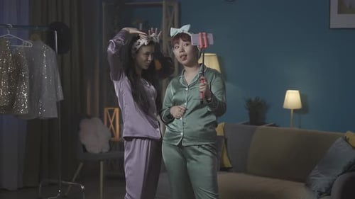 Two Friends Take Photos in Matching Pajamas