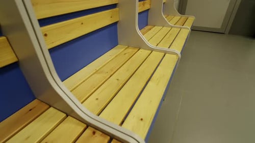 Polished Wooden Planks of Empty Dressing Area Seating Stalls