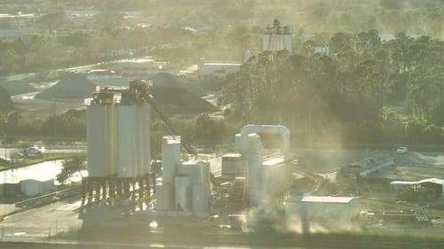 Aerial View of Concrete Mixing Factory at Industrial Area with Cement Trucks and Heavy Building