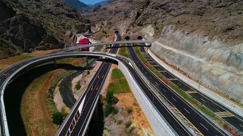 Aerial View of Highway Road with Mountain Landscape