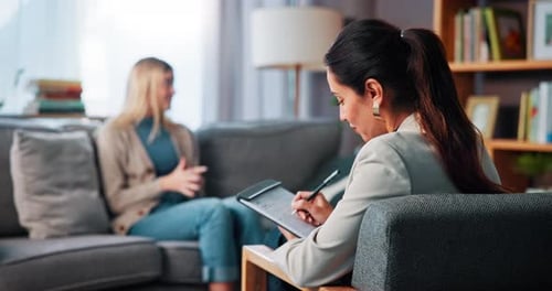 Woman, therapy and psychiatrist writing notes for mental health, support or listen for advice