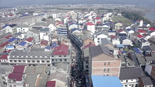 Aerial view of crowded street in Chinese town