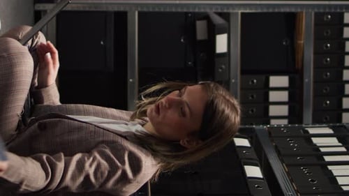 Team Meeting and Paperwork in an Office