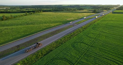 Aerial View of the Motorway with Busy Traffic on a Sunny Summer Day