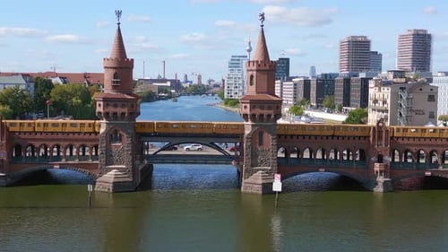 Suburban train Summer day east west Berlin Border River Bridge Germany. Great aerial top view flight