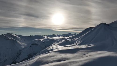 Aerial view of beautiful snowy mountains in Gudauri, Georgia