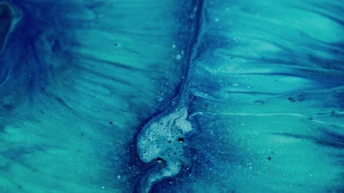Swirling Blue and Turquoise Abstract Paint Close-Up