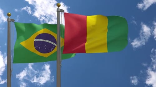 Flagge Brasiliens gegen Guinea-Flagge auf dem Fahn
