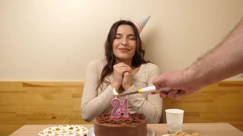 Happy Young Woman Celebrates Birthday at Home
