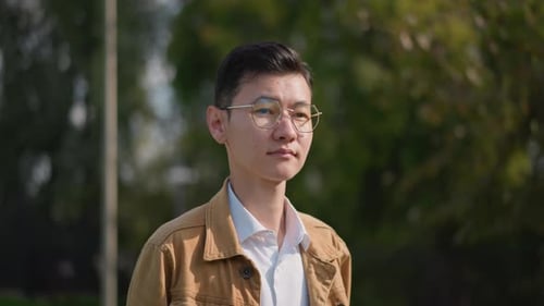 Contemplative Asian Man Outdoors Street Scene with Introspective Asian Gentleman Reflective Asian