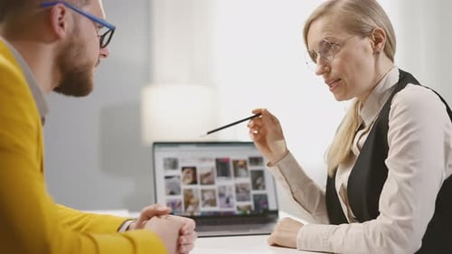 Designers Discussing Project in Office