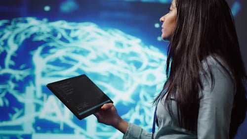 Close Up Shot of Computer Scientist Using Tablet in AI Company Workspace