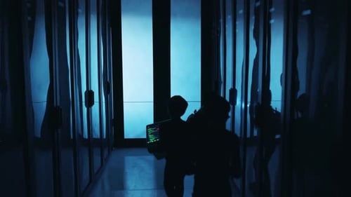 An Enigmatic and Mysterious Corridor Illuminated with Captivating Blue Lighting and Shadows