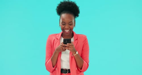Phone, message and happy black woman in studio texting, laugh or social media chat on blue