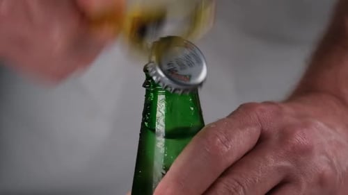 Opening a Green Bottle with Bottle Opener