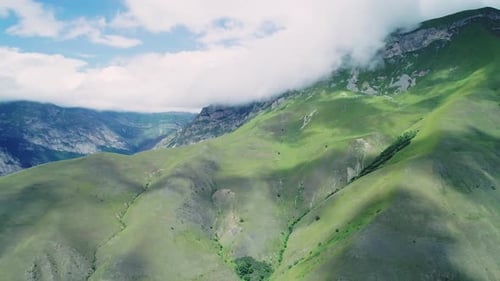 Aerial of Northern Caucasus Mountains on a Bright Sunny Day Majestic Scenery of Highlands of Region