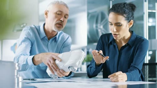 Experienced Automotive Designer and Female Engineer Works with a Concept Car Prototype Model, Perfe