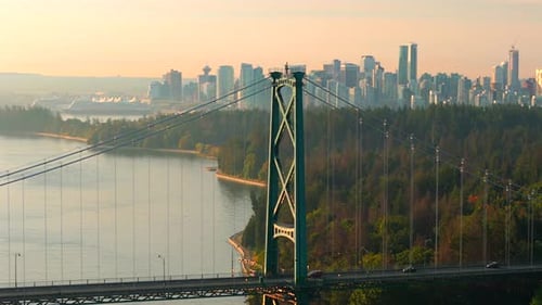 Aerial View of Lions Gate Bridge and Stanley Park at Dawn Canada