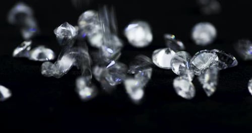 Sparkling Diamonds Falling in Slow Motion