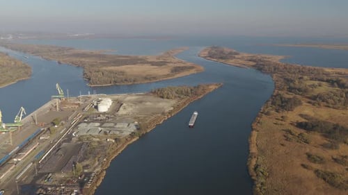 Global trade in motion as oil tanker navigates bustling waterways