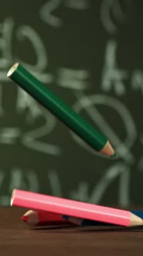 Pencils Fall on the School Desk Filmed on a Highspeed Camera at 1000 Fps
