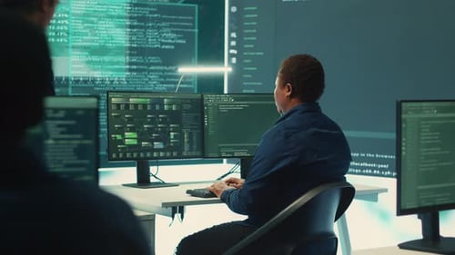 Programmers Collaborating in Modern Technology Office