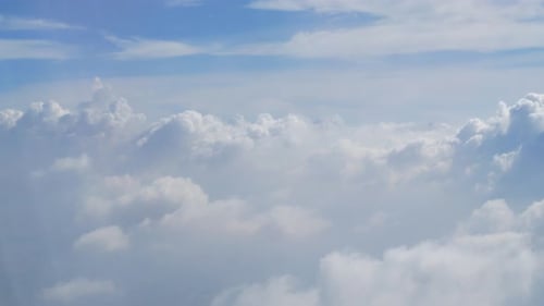 nature sky from airplane with clouds outdoor in summer daytime