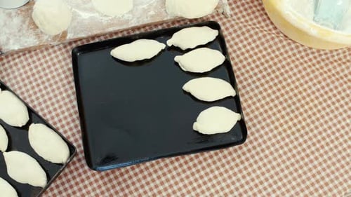 Uncooked Dough Being Prepared for Baking