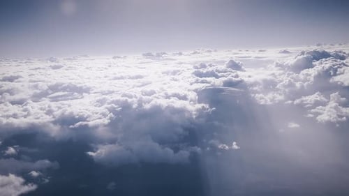 Breathtaking Aerial View of Clouds and Blue Sky