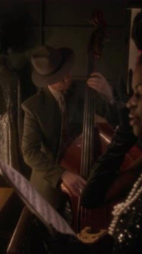 Jazz Band Performs Live Music in Dark Venue