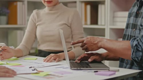 Close up of business hands are working and brainstorming on paperworks.